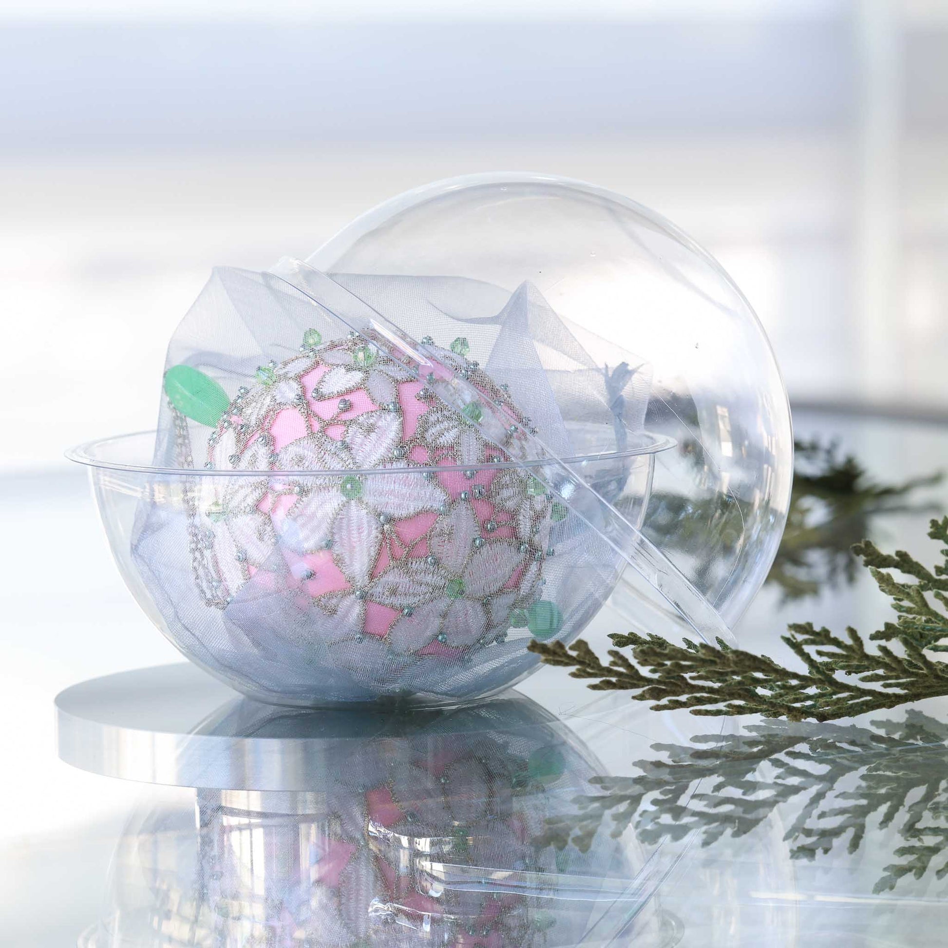 Pink handmade satin push pin ornament in a clear storage container, embellished with green beads and rose gold trim by Whim5seasons.