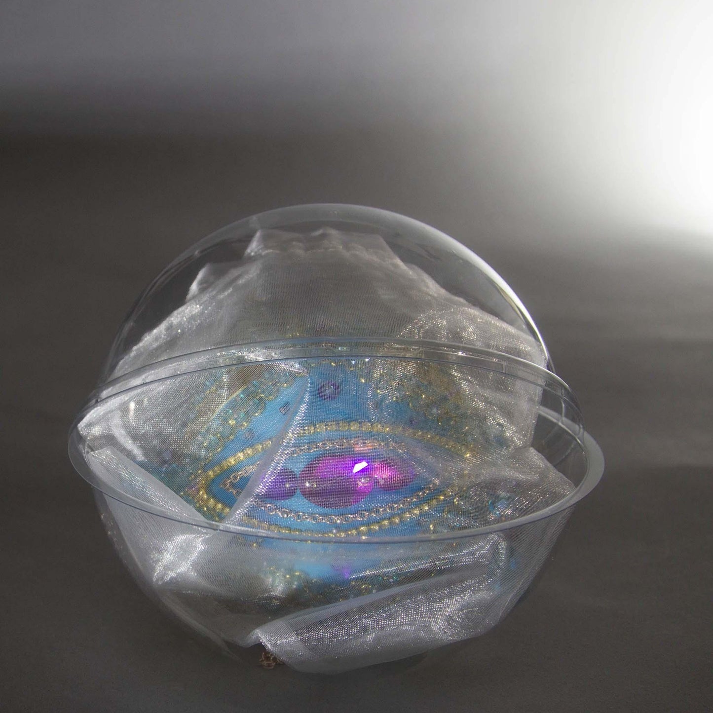 Handmade Christmas Beaded Ornament Ball embellished with sparkling rhinestones, goldtrim, and glass beads, in a clear storage container by Whim5seasons.