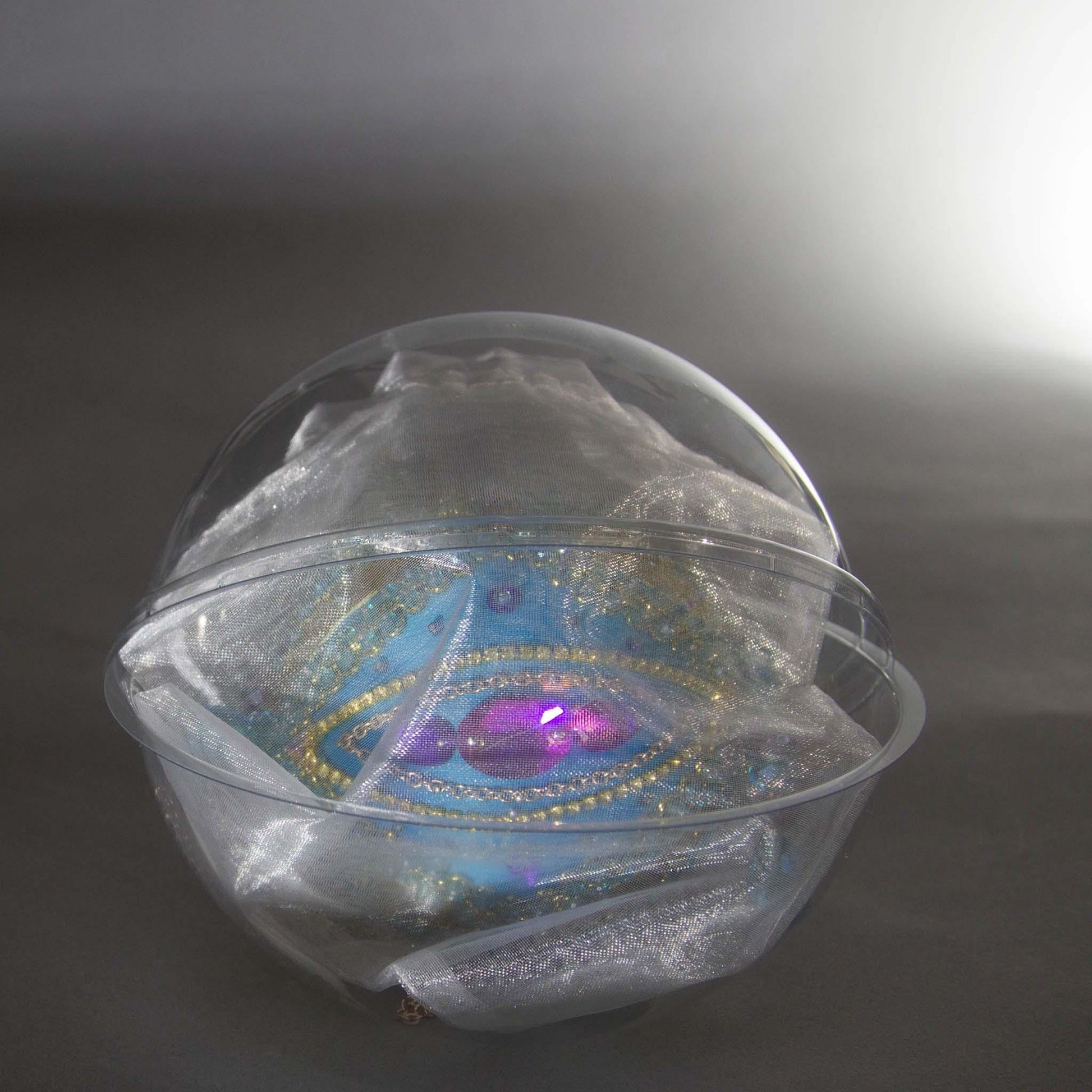 Handmade Christmas Beaded Ornament Ball embellished with sparkling rhinestones, goldtrim, and glass beads, in a clear storage container by Whim5seasons.