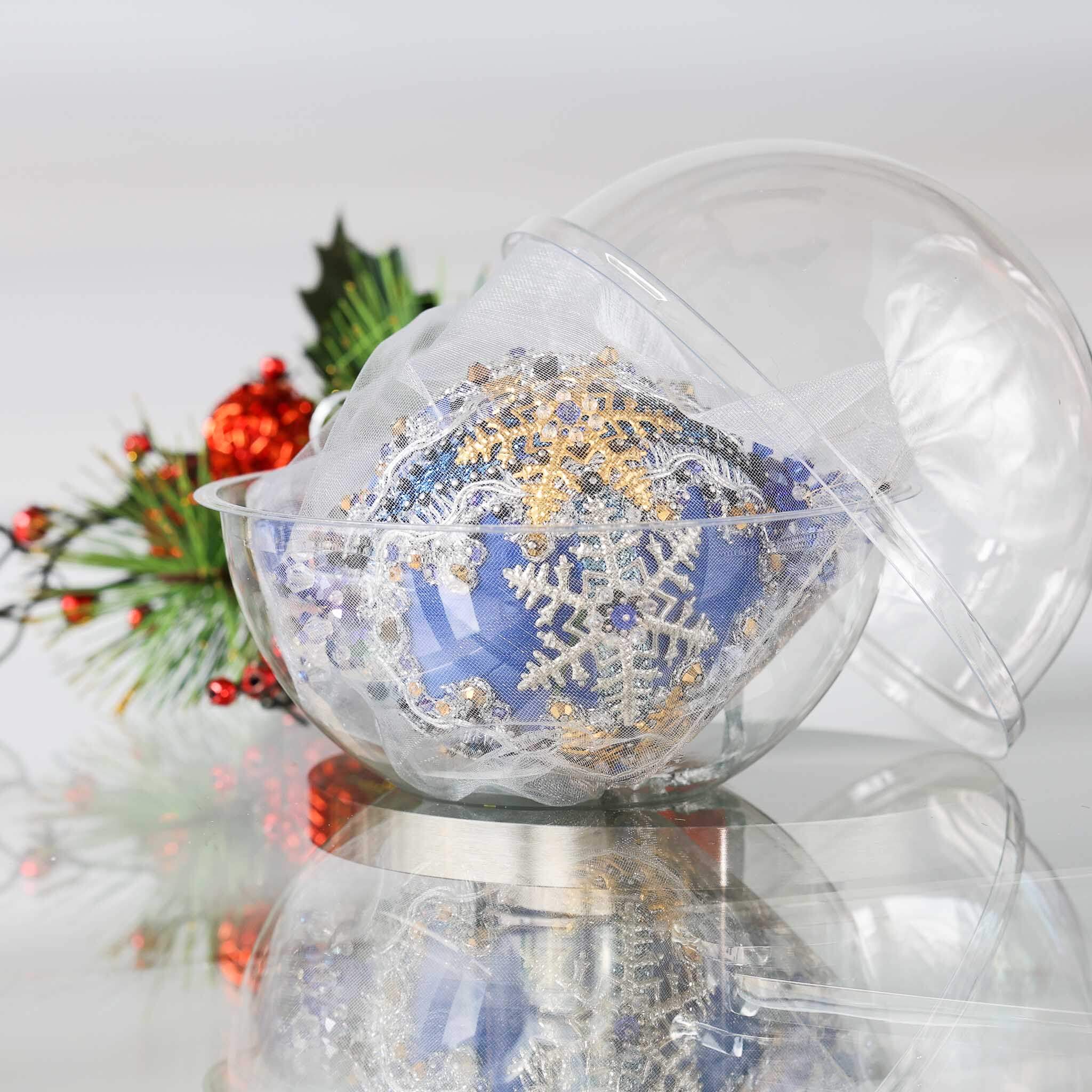 Decorative Handmade Christmas blue satin ball with a snowflake design inside a round clear storage container, surrounded by festive elements on a light background. (Blue)