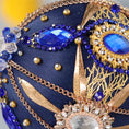 Load image into Gallery viewer, Close-up detail of a handmade satin push pin Christmas ornament with large blue rhinestones and gold chains secured in place with dressmaker pins by Whim5seasons. (Navy)
