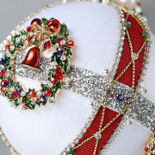 Close-up of a handmade Christmas beaded push pin satin ball showing small pearl bead pinned with dressmaker pins by Whim5seasons.
