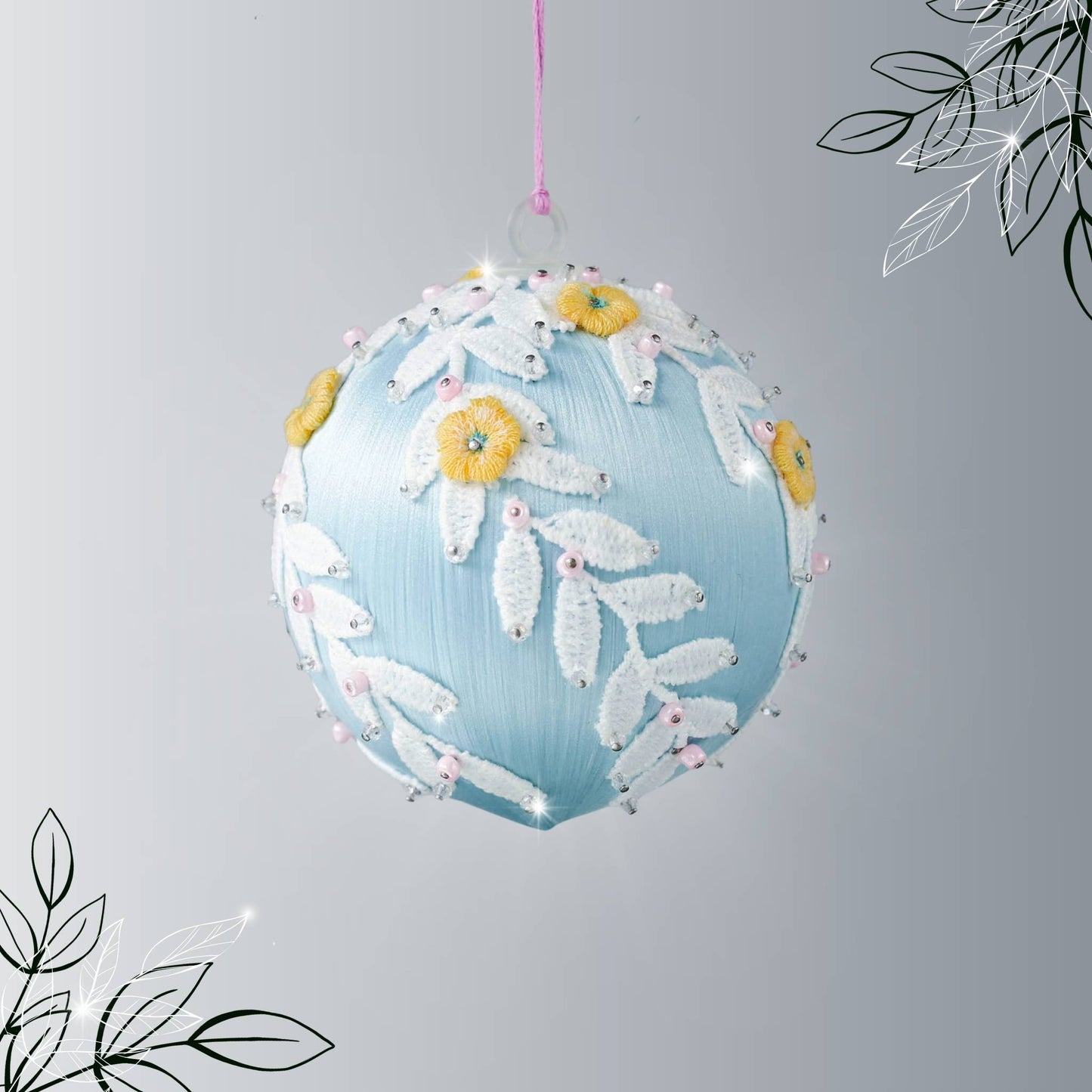 Handmade Mid-Century Style Beaded Christmas ornament  - a satin push pin core as a base, embellished with white lace trim, yellow embroidered flowers, and pink and clear beads, hanging on a pink string loop by Whim5seasons.