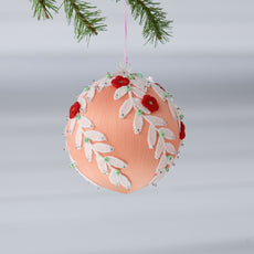 Handmade Christmas or Easter Beaded push pin Ornament Ball embellished with small red embroidered flowers, white trim, and beads hanging from a holiday branch. (Coral)