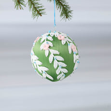 Handmade olive green Christmas or Easter Beaded push pin Ornament Ball embellished with flowers, white trim, and beads hanging on a blue string. (Olive)