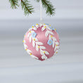 Load image into Gallery viewer, Handmade Christmas or Easter Beaded push pin Ornament Ball with blue embroidered flower patches, white trim, and beads pinned to a satin foam core and hanging on a light gray background.  (Pale Violet Red)
