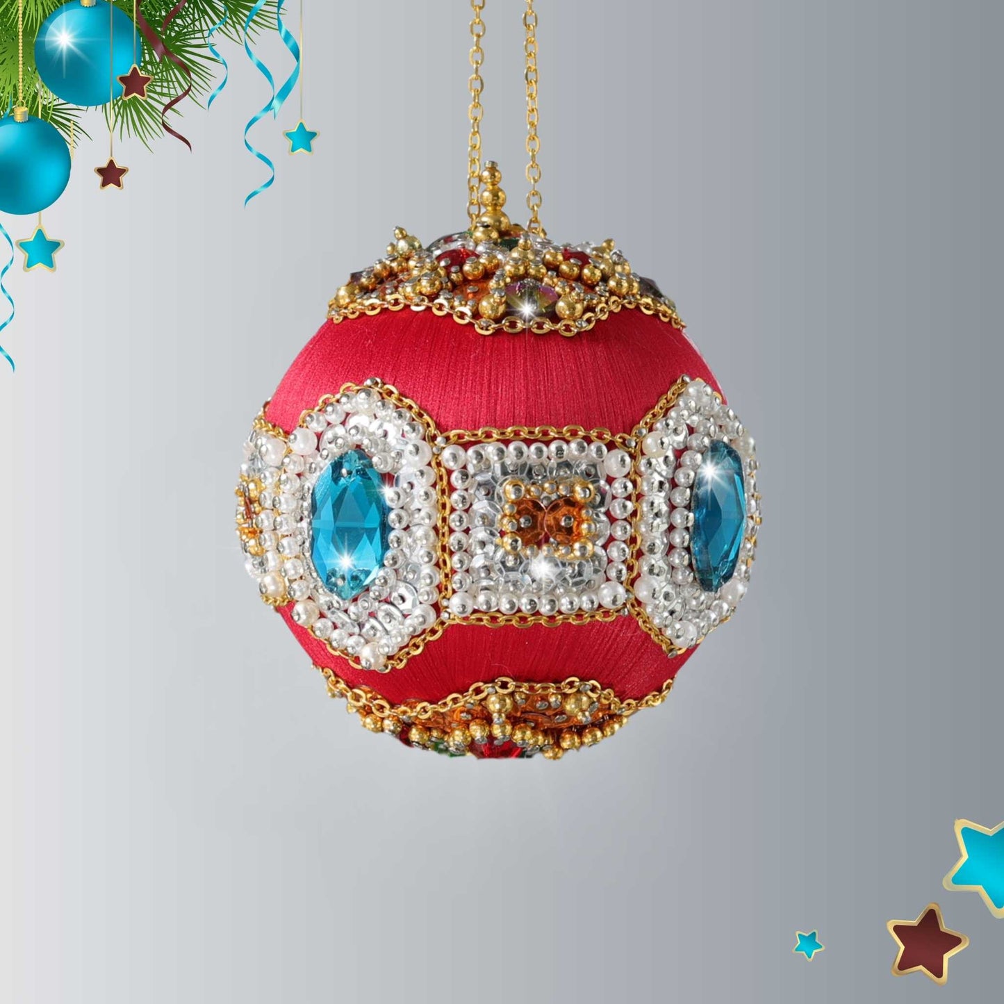 Handmade Satin Ornament - Dark red beaded Christmas Ball, embellished with blue glass rhinestones and hundreds of pearls and sequins, in front of a festive tree by Whim5seasons.