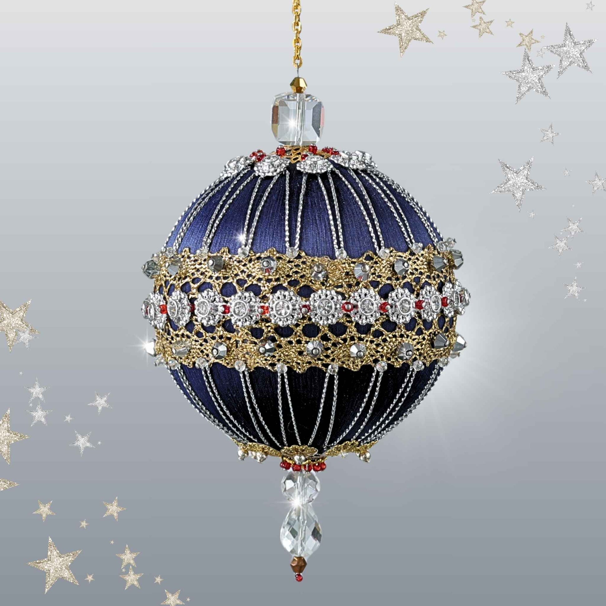 Handmade sequin & beaded mid-century style ornament featuring  clear beads hanging in front of gray background and gold and silver stars by Whim5seasons.
