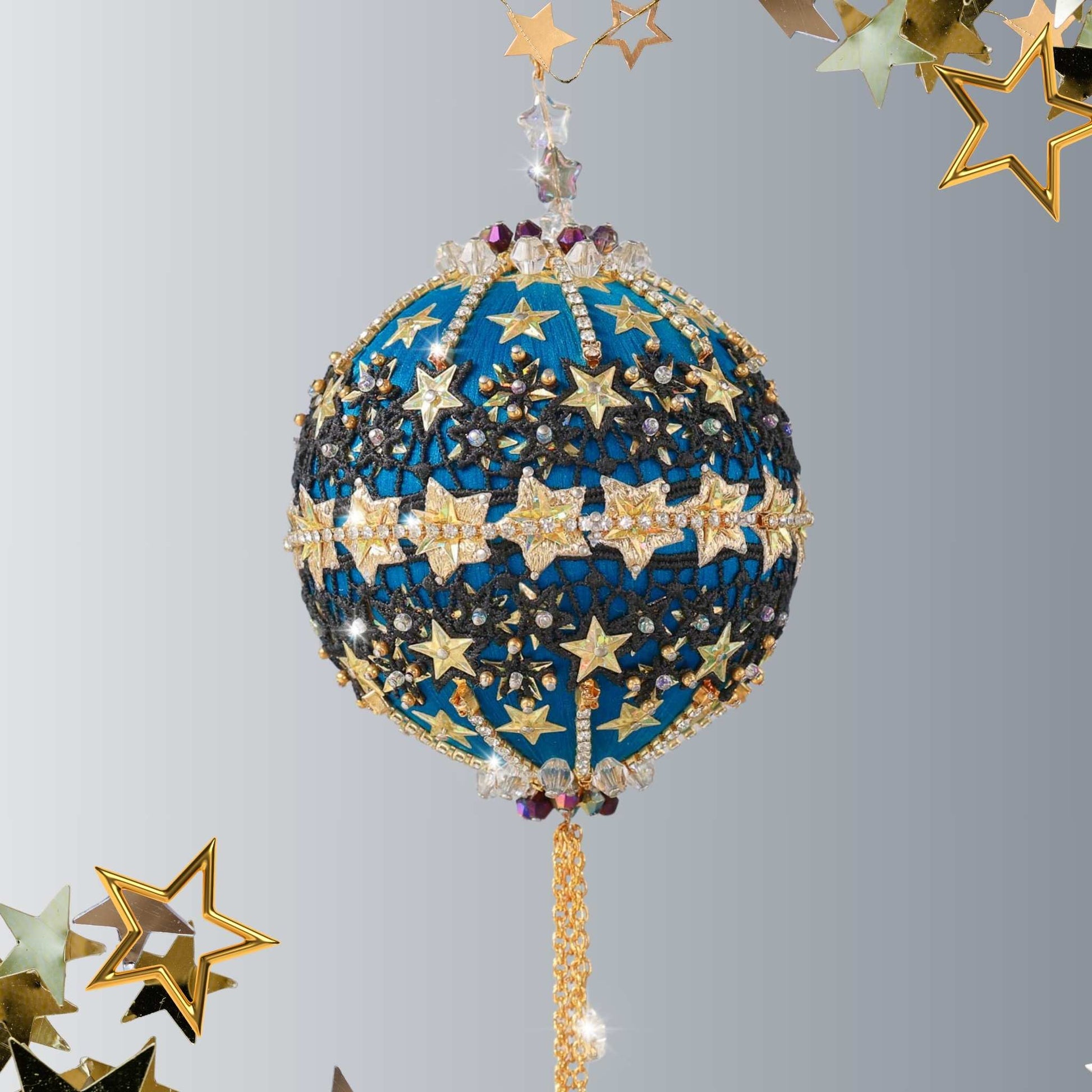Handmade Christmas Push Pin Ornament from Whim5seasons features sparkly rhinestone chains, gold star trim ,and star sequins pictured against a light gray background with a gold star by Whim5seasons.