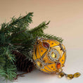 Load image into Gallery viewer, Beautiful retro mid-century stile satin Christmas ornament with a green branch on a beige background by Whim5seasons. (Light Yellow)
