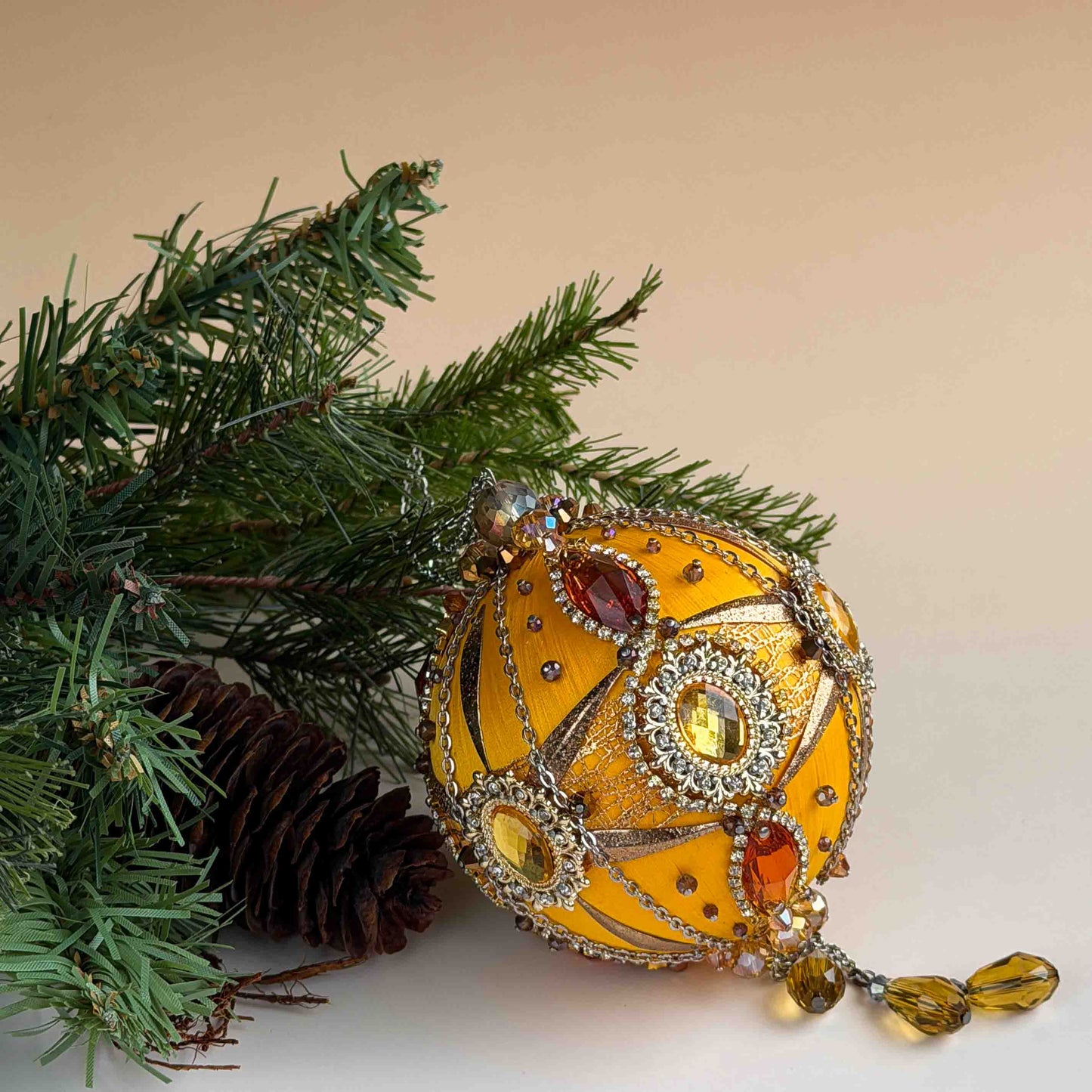 Beautiful retro mid-century stile satin Christmas ornament with a green branch on a beige background by Whim5seasons. (Light Yellow)