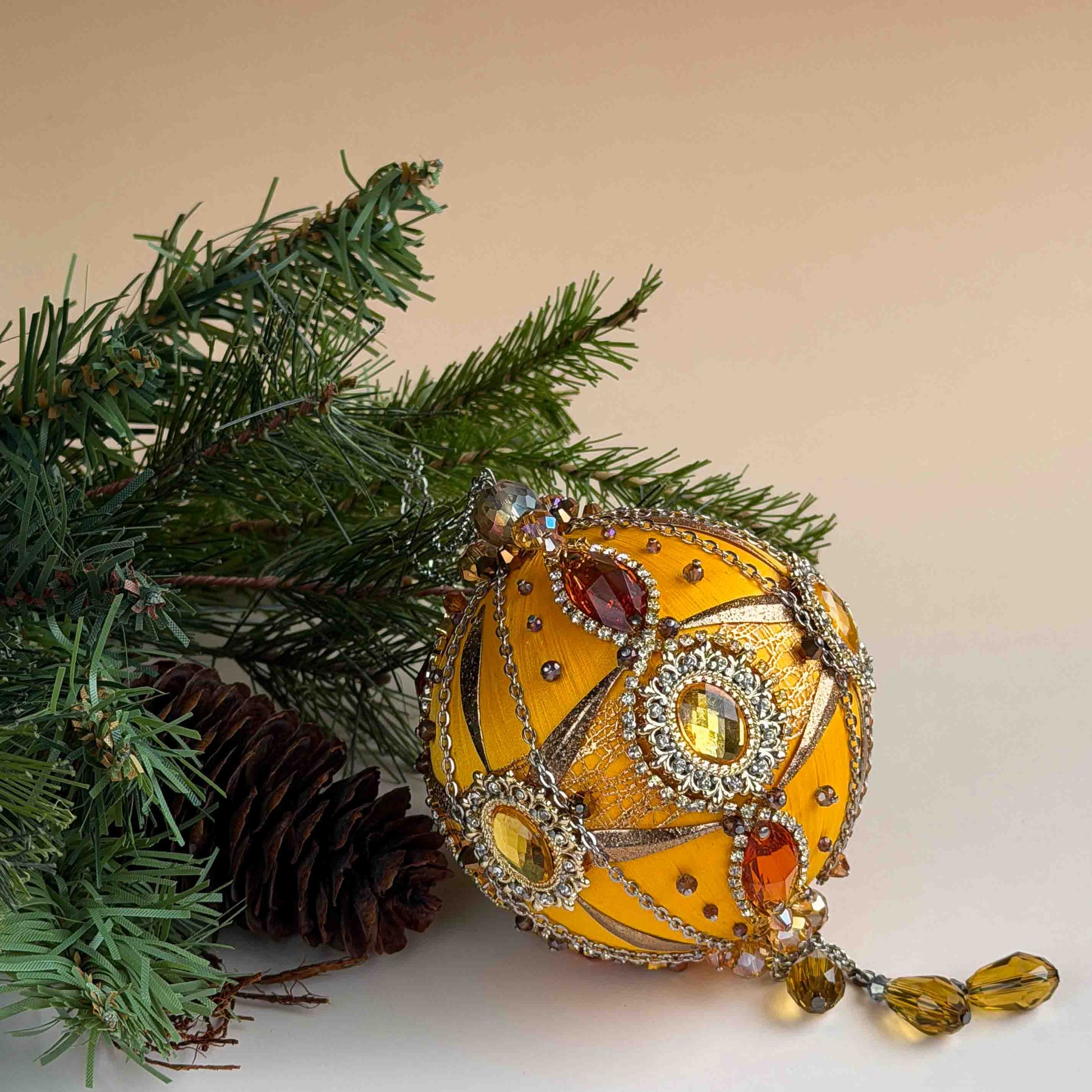 Beautiful retro mid-century stile satin Christmas ornament with a green branch on a beige background by Whim5seasons. (Light Yellow)