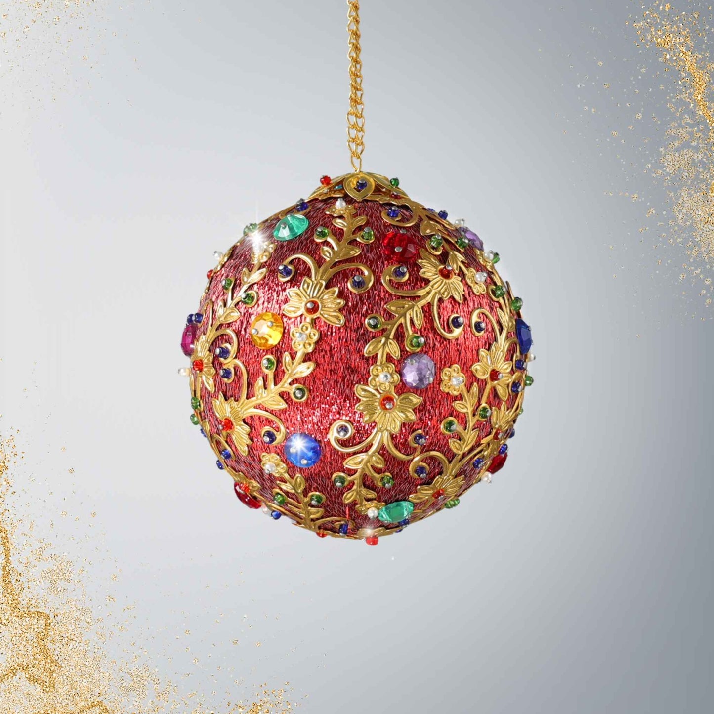 Red metallic handmade Christmas Satin Ornament with gold metal embellishments and multicolor rhinestones  on a light gray background by Whim5seasons.