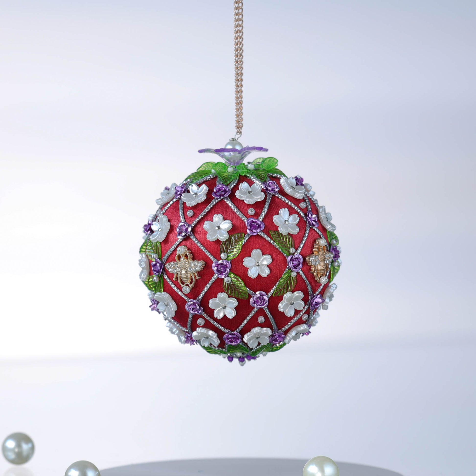Richly-colored burgundy handmade beaded satin ornament with white flowers, gold bee charm, and silver cording by Whim5seasons.