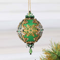 Load image into Gallery viewer, Handmade Completed Christmas Push Pin Ornament featuring gold and silver snowflake charms, metallic trim on a white background. (Green)

