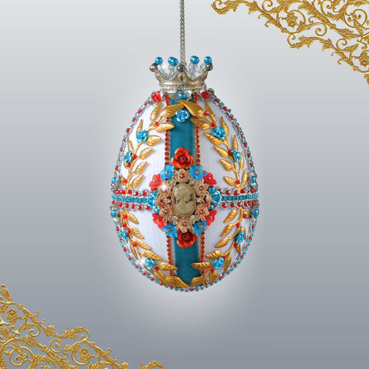 Handmade Easter Egg Satin Ornament  by Whim5seasons - DIY white satin egg meticulously crafted with gold alloy leaves, hundreds of beads, and silver crown with blue ribbon.