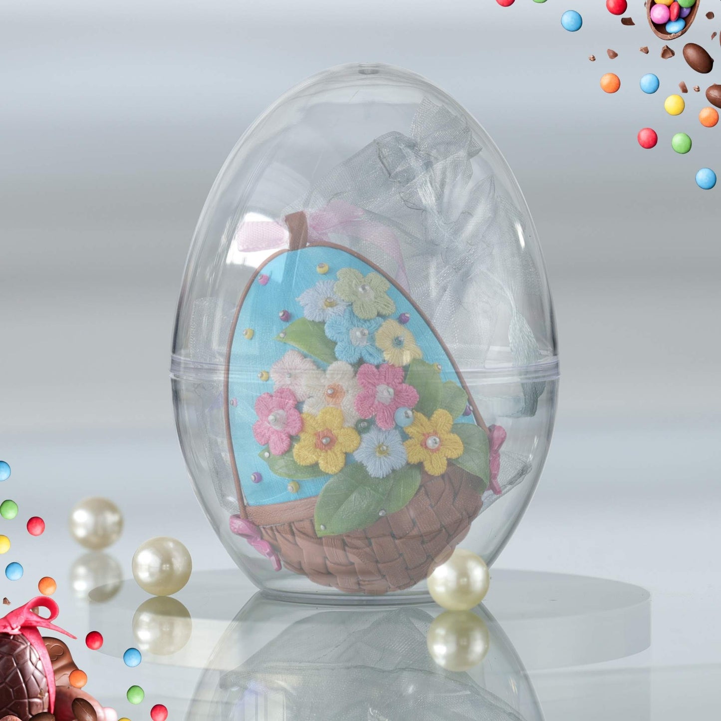Adorable handmade push pin Easter egg  with flowers inside a clear storage container in a reflective surface by Whim5seasons.