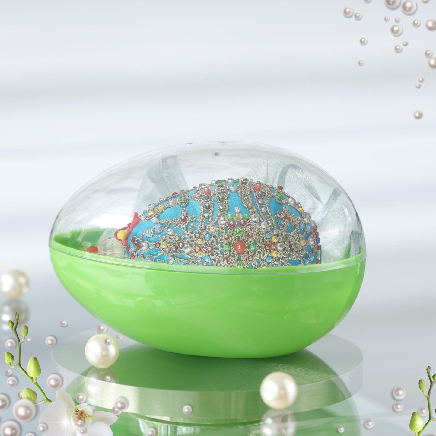 Handmade satin ornament Misbah in organza bag packed in an egg-shaped container with a clear lid by Whim5seasons.