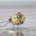 Load image into Gallery viewer, Handmade Easter Push Pin Ornament embellished with crystals, beads, and metallic trim on a silver stand against a light gray background by Whim5seasons. 
