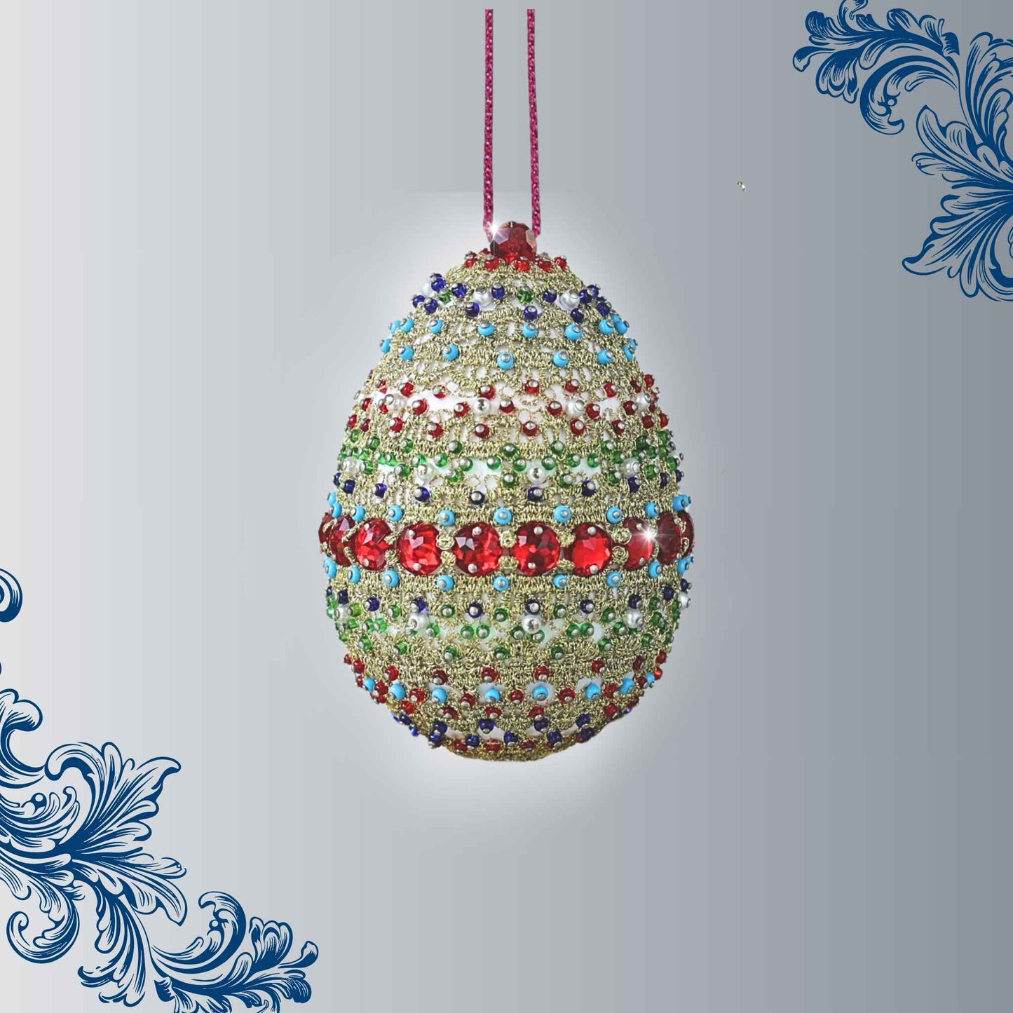 A complete handmade Easter Egg Ornament, push pin method using premium  satin  gold egg shaped core, bead embellishments, gold metallic trim, and a hundreds of seed beads by Whim5seasons. 