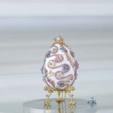 A complete handmade Easter Egg Ornament, push pin method using premium  satin  gold egg shaped core, bead embellishments, gold trim, and a crown charm by Whim5seasons. 