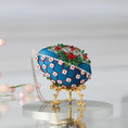 Load image into Gallery viewer, Handmade Easter Push Pin Ornament embellished with aluminum roses, acrylic leaf charms, and metallic trim on a gold stand with spring pink branch. (Dark Slate Blue).
