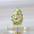 Load image into Gallery viewer, Luxurious handmade push pin Easter Egg on a gold stand with large pearls set against a light background featuring gold, pink, and green colors Whim5seasons. (Dark Red)
