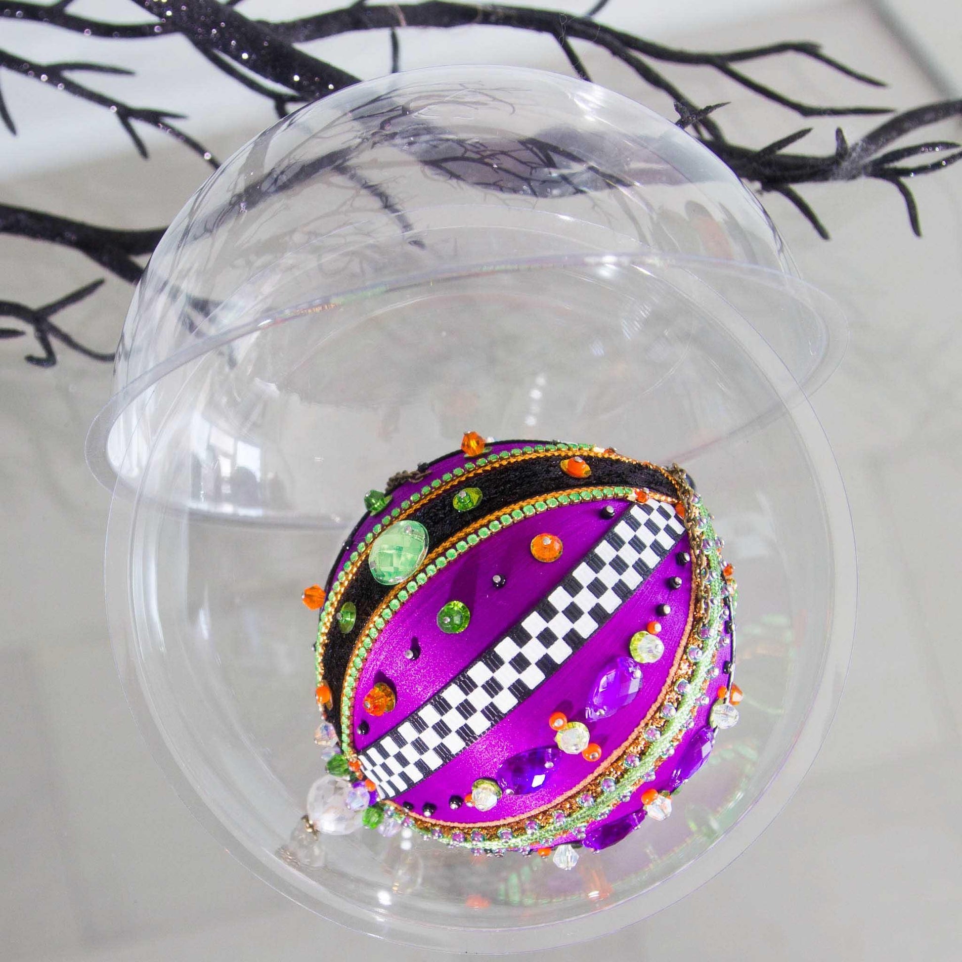 Fun bright purple Halloween satin beaded ornament handmade by Whim5seasons packed in a clear storage container.