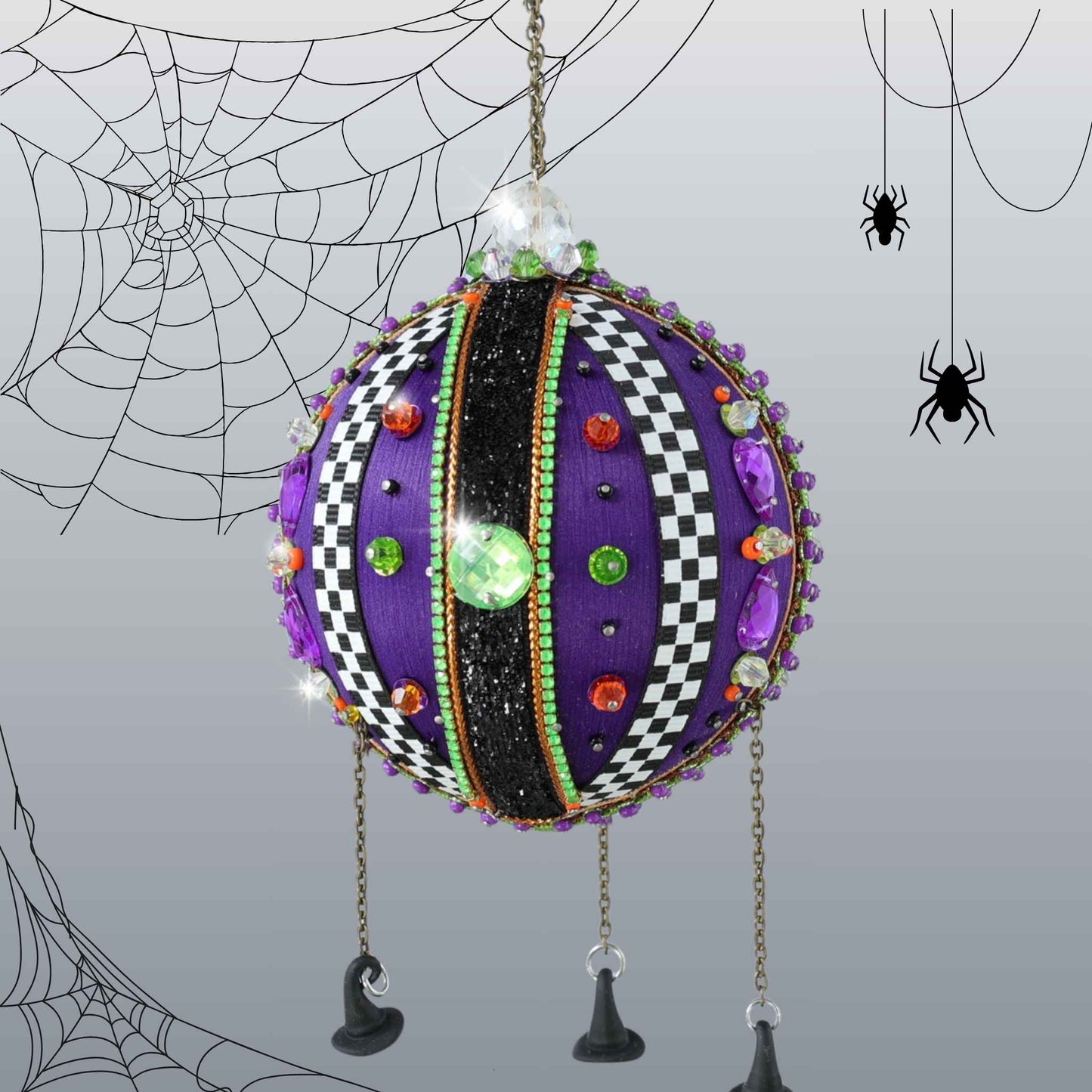 Handmade beaded purple halloween ornament with colorful embellishments and miniature witch hat charms by Whim5seasons.