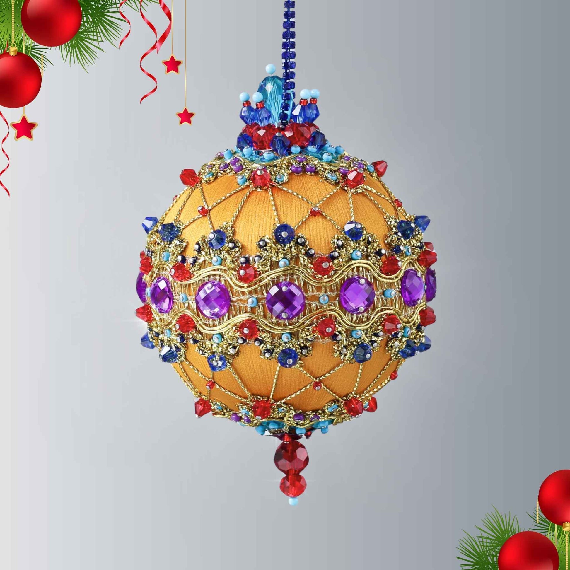 Gold colored handmade push pin ornament  hanging on a blue rhinestone chain - with purple rhinestones, sparkling gold trim, sequins, indigo rhinestone chain, and metallic cord by Whim5seasons.