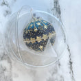 Load image into Gallery viewer, Handmade New Year Star Ornament from Whim5seasons in a clear round storage container wrapped in organza.  (Dark Slate Blue)
