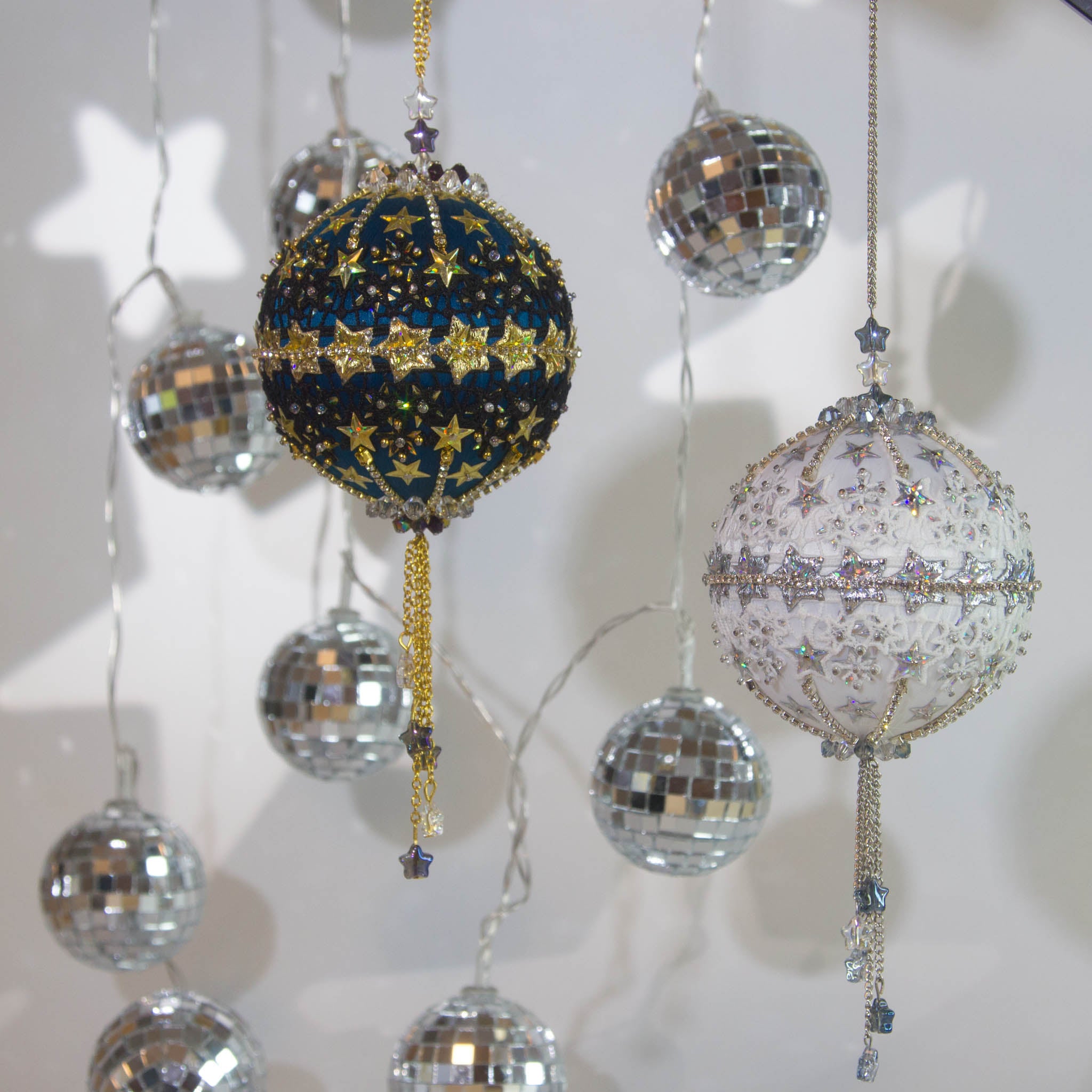 A collection of dazzling handmade New Year Star Ornament Collection from Whim5seasons. Add holiday sparkle to you Christmas decor!