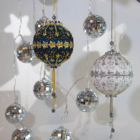 A collection of dazzling handmade New Year Star Ornament Collection from Whim5seasons. Add holiday sparkle to you Christmas decor!
