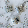Load image into Gallery viewer, White New Year Star Ornament Kit  from Whim5seasons includes: silver star trim and sequin, rhinestone chains, pins, and more - from Whim5seasons. (White)
