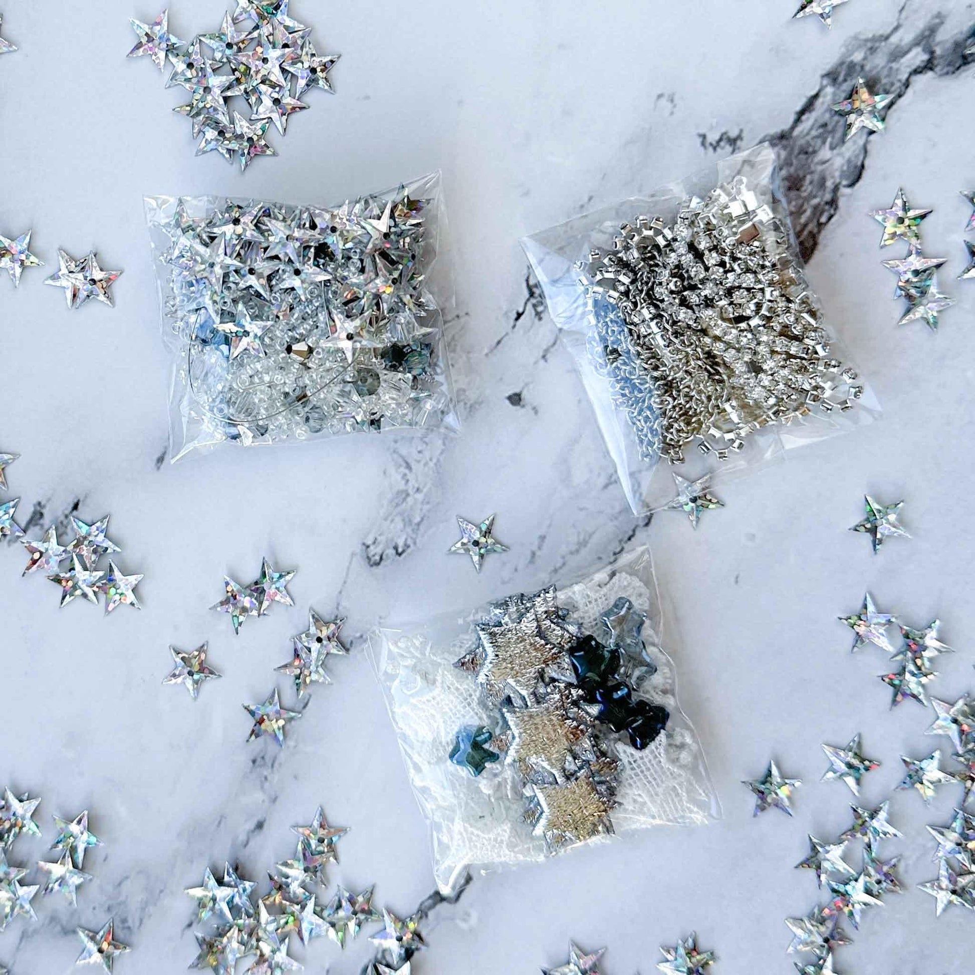 White New Year Star Ornament Kit  from Whim5seasons includes: silver star trim and sequin, rhinestone chains, pins, and more - from Whim5seasons. (White)
