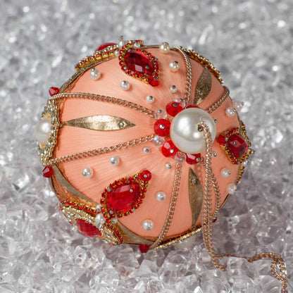 Phoenix Christmas Beaded Handmade Satin Ornament features large top pearls bead, beautifully contrasted against the peachy satin ornament. (Coral)