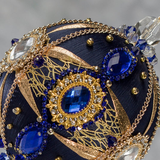 Phoenix Christmas Push Pin Satin Ornament features large cameos with bright rhinestones, beautifully contrasted against the dark navy satin ornament. (Navy)