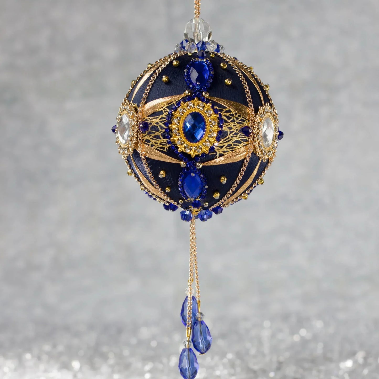 Phoenix Christmas Beaded Handmade Satin Ornament features large cameos with indigo blue rhinestones, gold alloy accents, and rose old chain. (Navy)