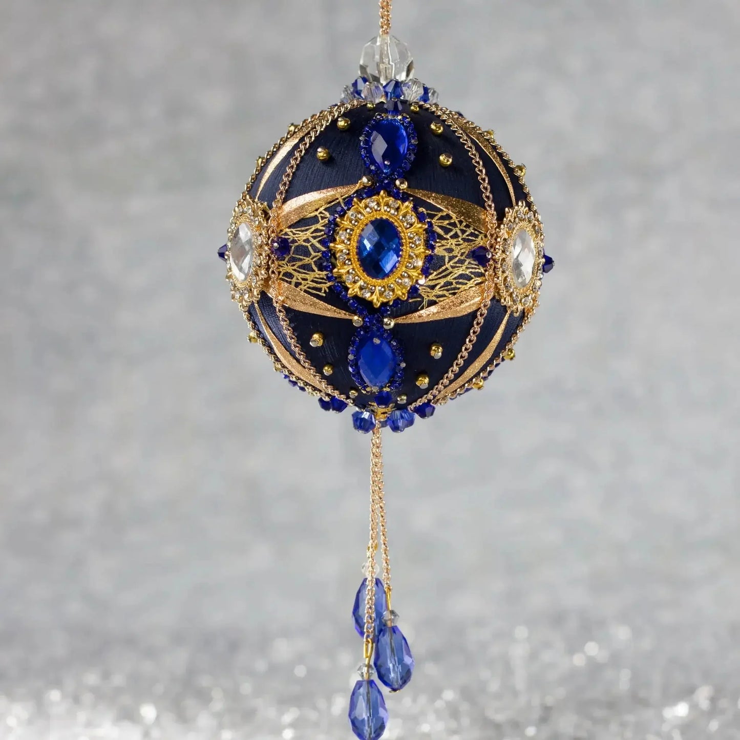 Phoenix Christmas Beaded Handmade Satin Ornament features large cameos with indigo blue rhinestones, gold alloy accents, and rose old chain. (Navy)