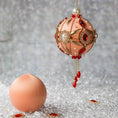 Load image into Gallery viewer, Phoenix Christmas Beaded Push Pin Satin Ornament Kit features large cameos with red rhinestones, gold alloy accents, and gold chain. (Coral)
