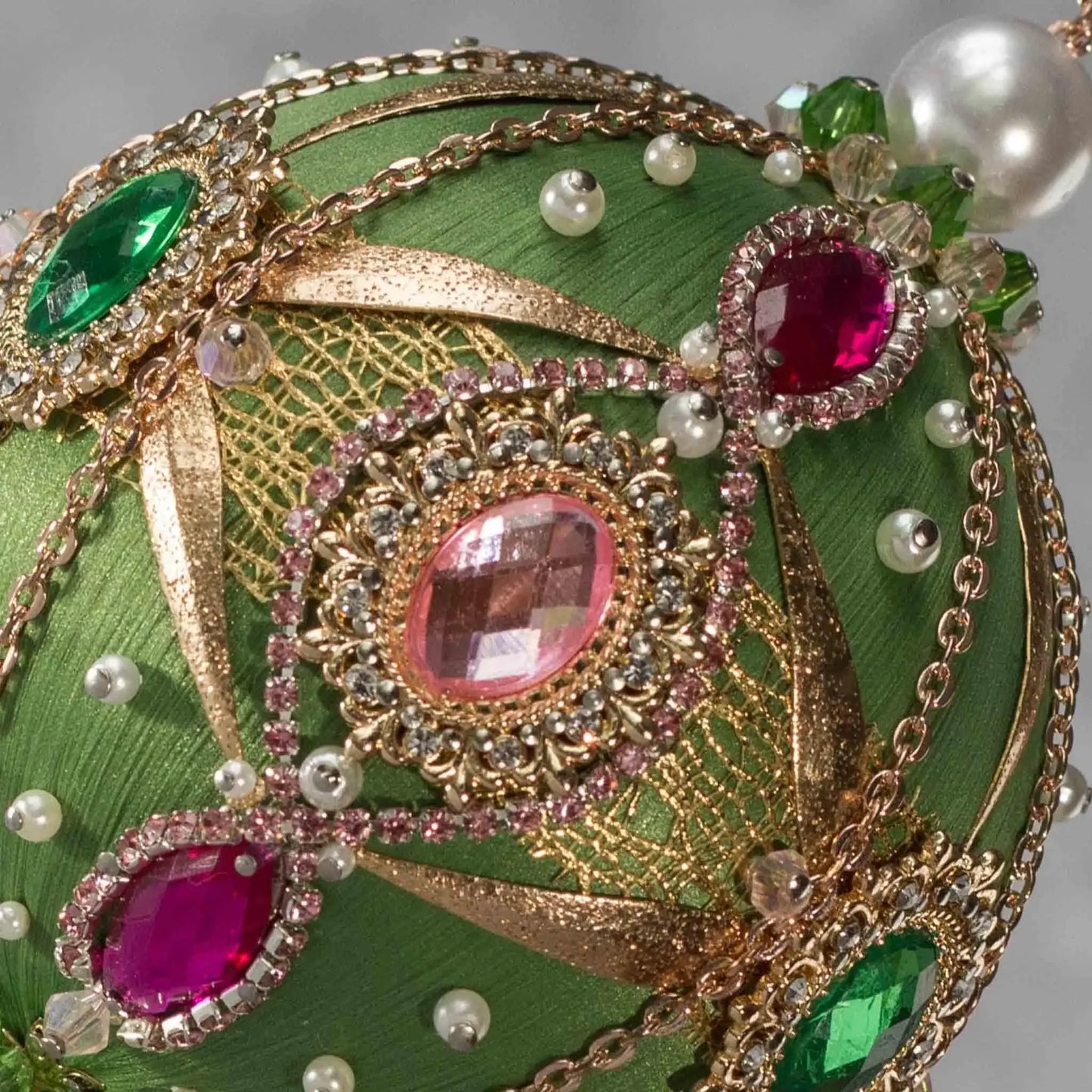 Phoenix Christmas Beaded Handmade Satin Ornament features large cameos with bright pink rhinestones, beautifully contrasted against the sage colored ornament. (Olive)