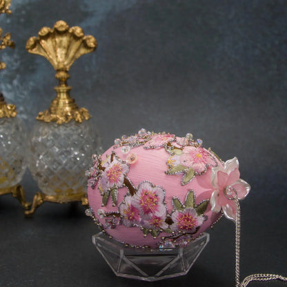 Top Pearly flower on handmade Easter Egg Push Pin Ornament  by Whim5seasons - white satin egg with pink plum bloom embroidery patches and silver cording. (Light Pink)