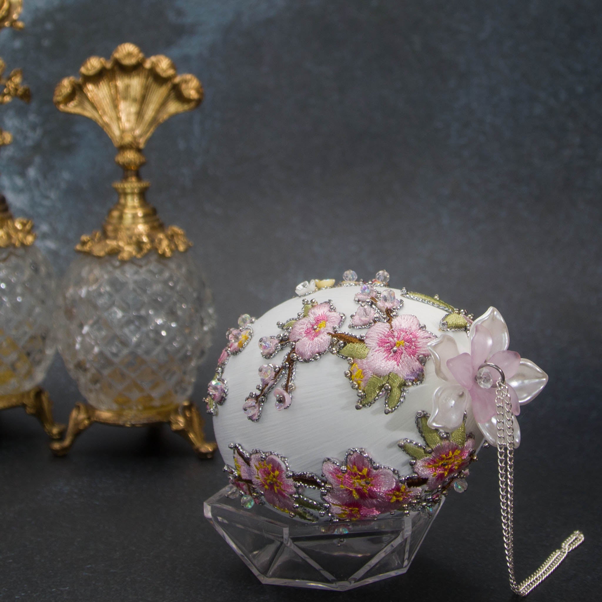 Top Pearly flower on handmade Easter Egg Push Pin Ornament  by Whim5seasons - white satin egg with pink plum bloom embroidery patches and silver cording. (White)
