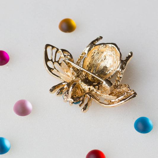 The back of a Bee brooch, approximately 2" by 2". Versatile embellishment for a garment, handbag, or a large ornament from Whim5seasons.