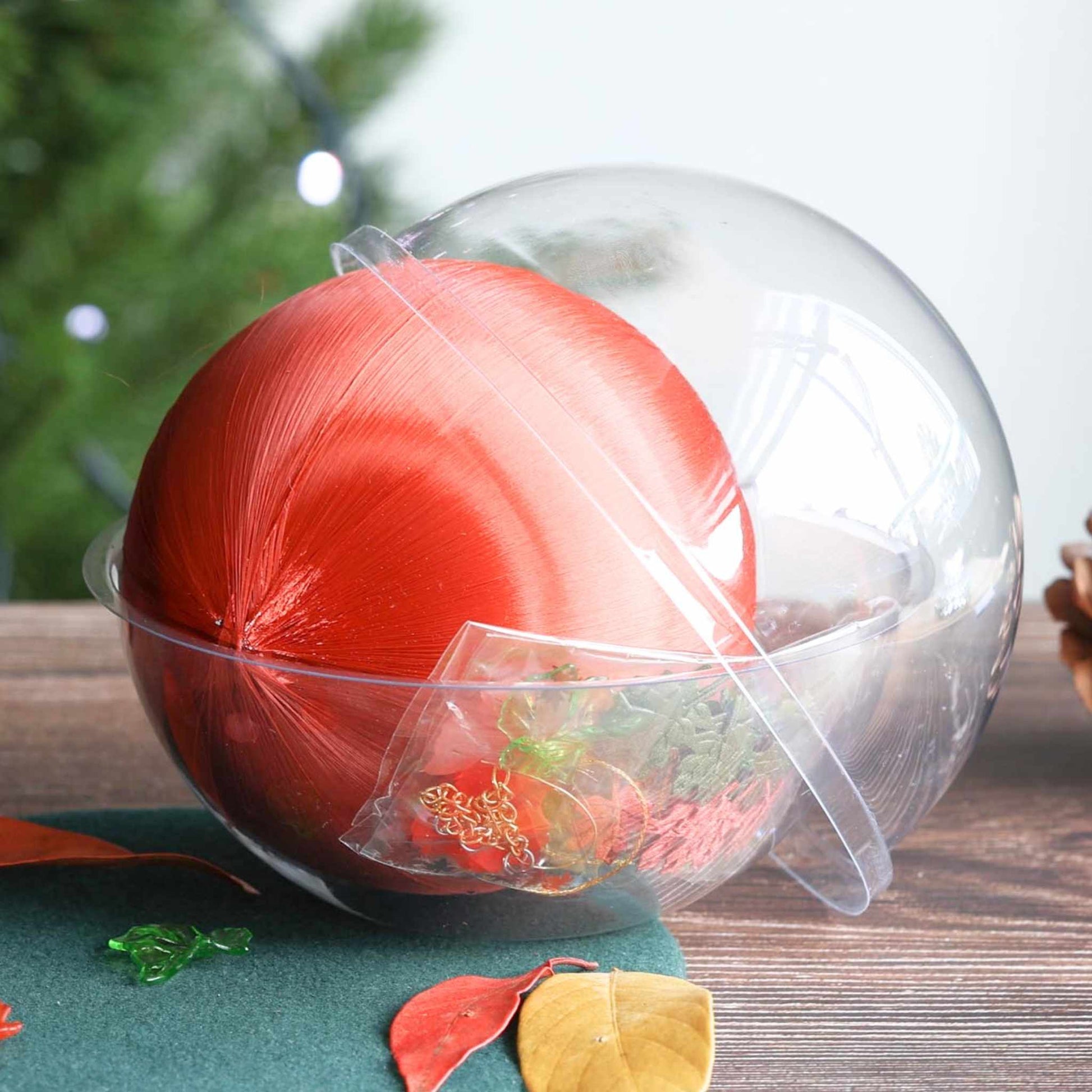 Bespoke beaded Thanksgiving or Christmas Ornament kit showing packaging and materials for a DIY project in a clear round container in front of a Christmas tree by Whim5seasons.